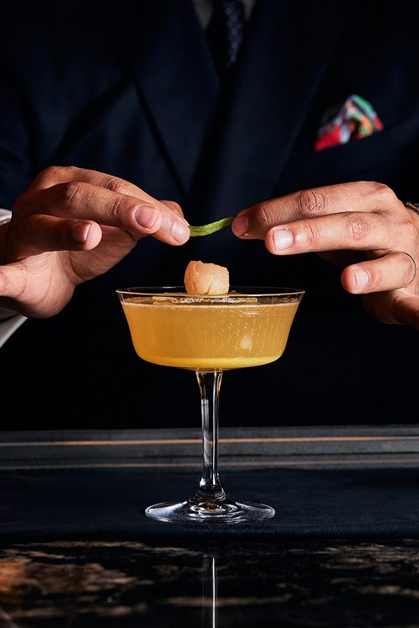 Yellow cocktail drink served in Four Seasons Hong Kong
